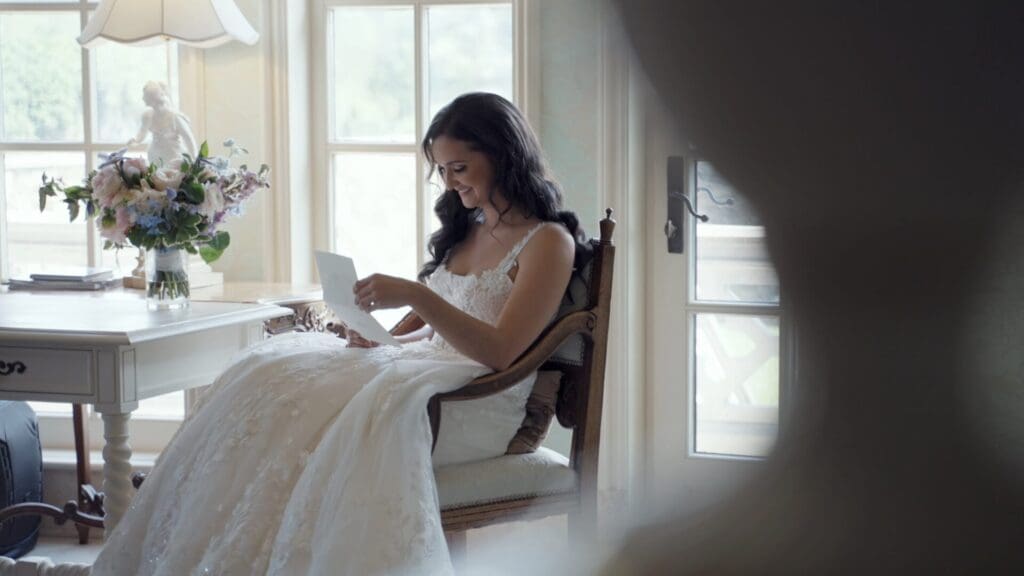 Bride reading personal letter from groom.
